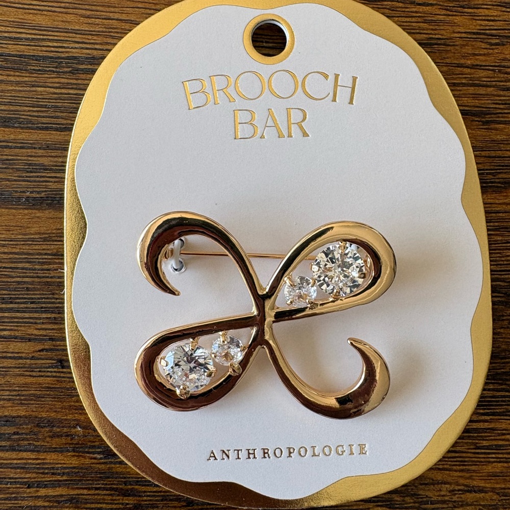 Anthropologie Gold Swirl Brooch with Crystals